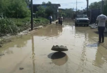 Calle inundada en Álamo Temapache durante el operativo de emergencia de Conagua