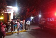 Calle Unión en Poza Rica con ambulancia de Salud Municipal en la escena del choque